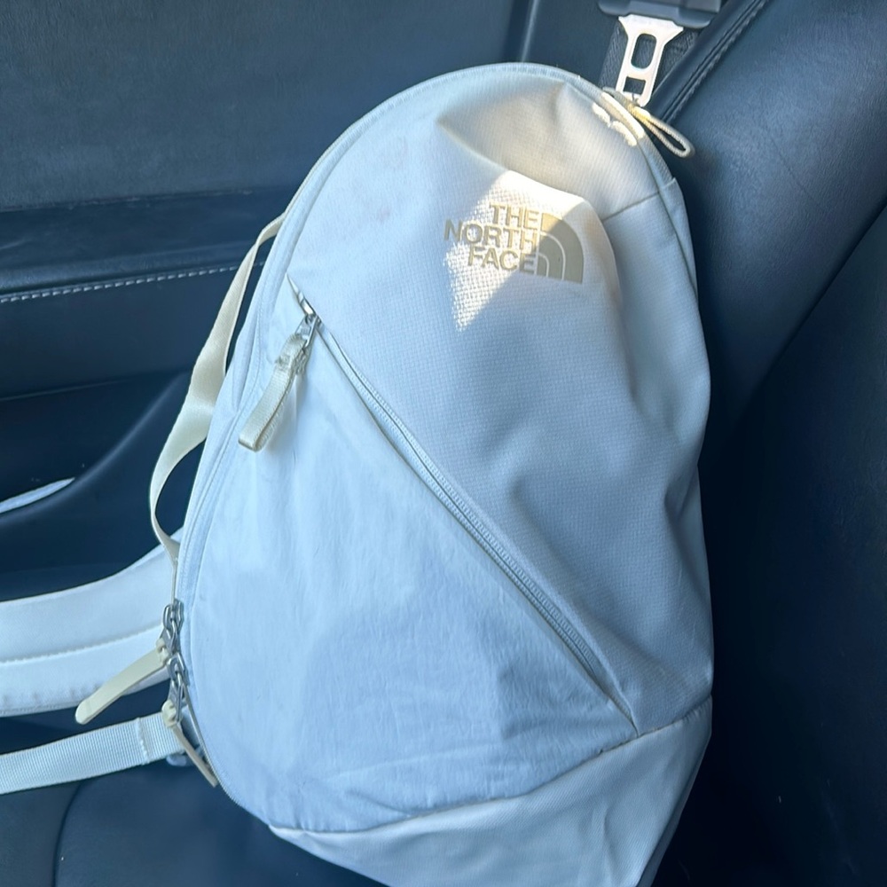 The North Face small one strap backpack. NWT